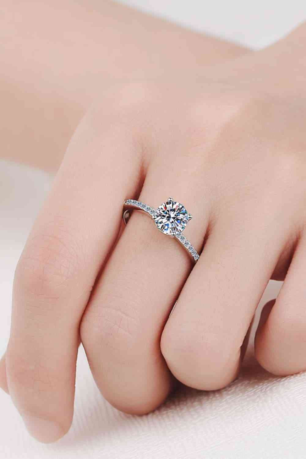 Stunning 1 Carat Moissanite Ring with Elegant Side Stones in Rhodium-Plated Silver Setting